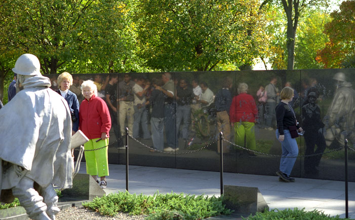 Shot showing the reflection of visitors as well as the etched images on the wall of the Korean Memorial - 46-5.jpg